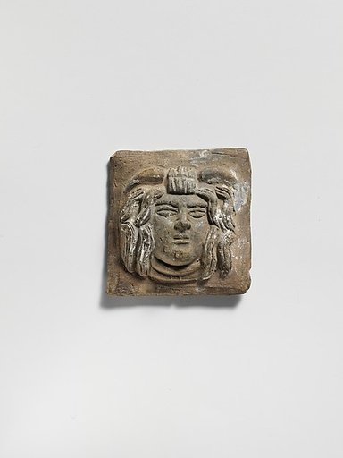 Terracotta relief plaque with head of Medusa