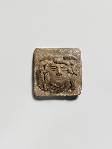 Terracotta relief plaque with head of Medusa