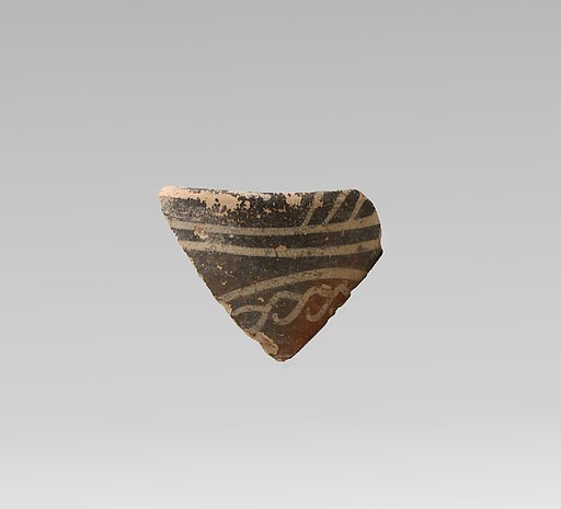 Terracotta rim fragment with quirks and bands
