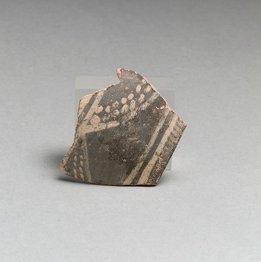 Terracotta rim fragment with bands and dots