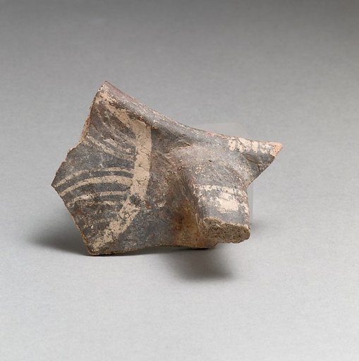Terracotta rim and handle fragment from a jug