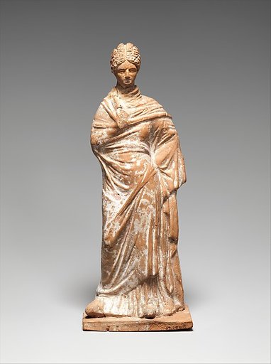Terracotta statuette of a standing woman