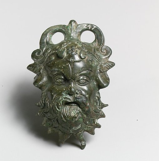Bronze situla (pail) attachment in the form of a Silenos head