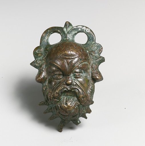 Bronze situla (pail) attachment in the form of a Silenos head