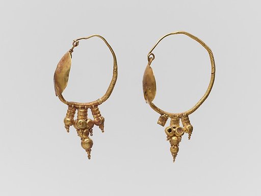 Pair of gold earrings with disk and pendant clustered spheres