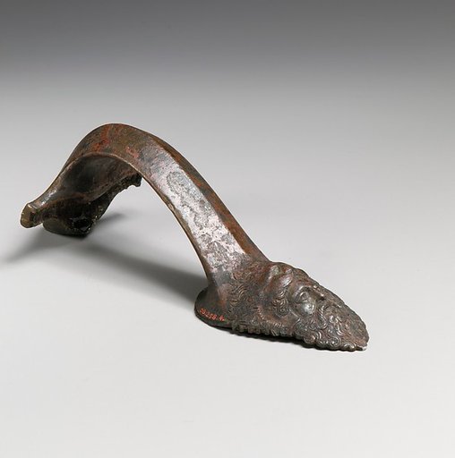 Bronze handle of an oinochoe (jug)