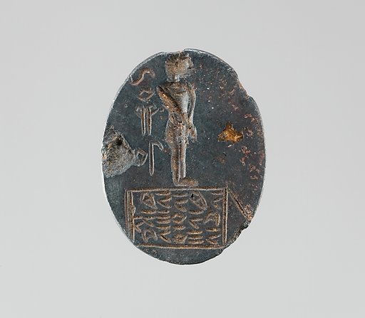 Haematite intaglio: Youth on inscribed stele