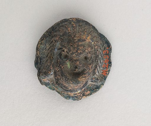 Glass appliqué with theatrical mask