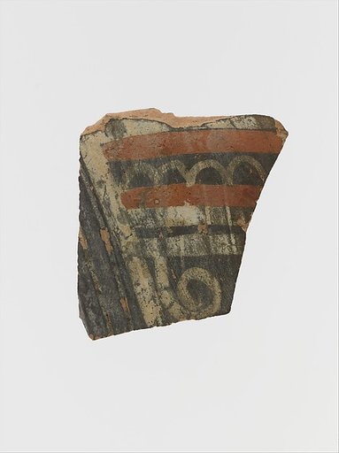 Terracotta fragment of a cup with spiral and bands
