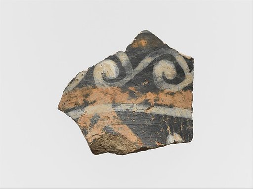Terracotta rim of a cup with spirals and band