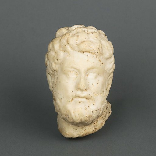 Marble statuette head of a bearded man