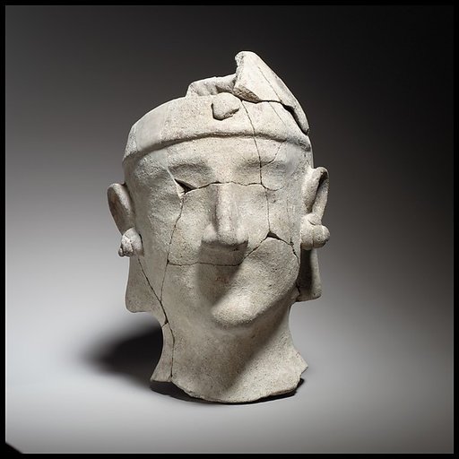 Beardless male head wearing a helmet