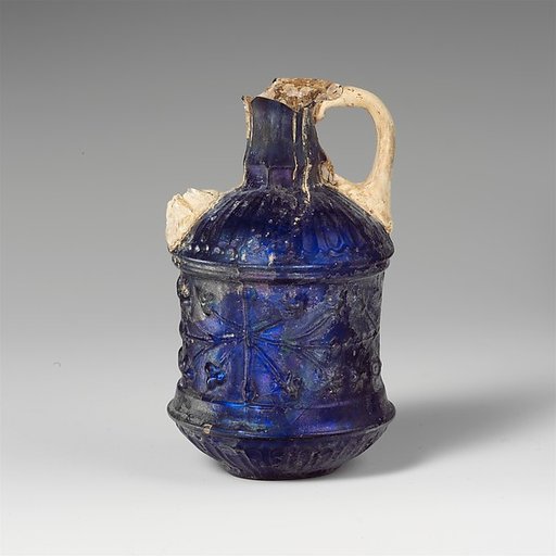 Glass two-handled bottle