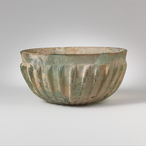 Glass hemispherical ribbed bowl