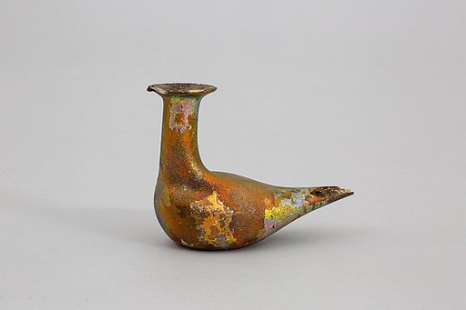 Glass bottle in the form of a bird