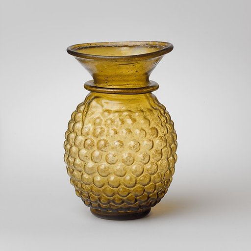 Glass jar in the shape of a bunch of grapes