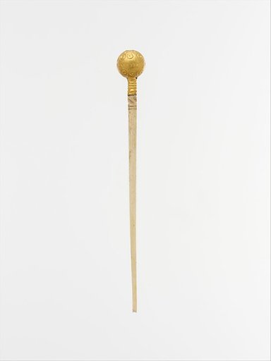 Ivory and gold pin