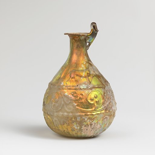 Glass hunt-and-scroll bottle
