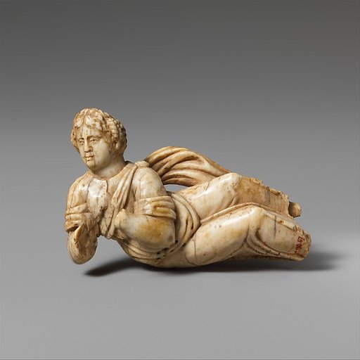 Ivory statuette of a reclining woman