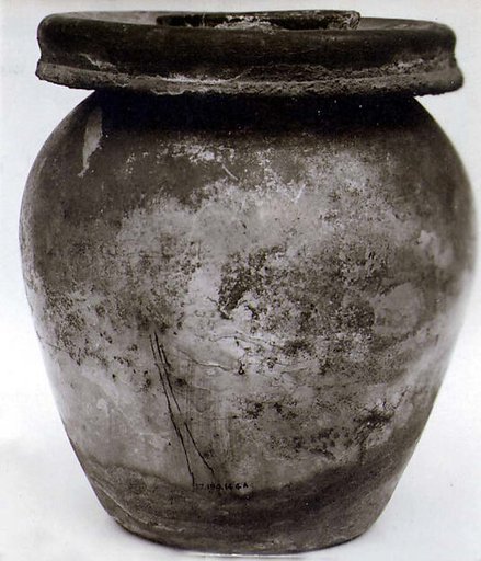 Glass jar (olla) used as a cinerary urn