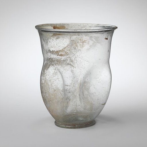 Glass beaker with indented sides