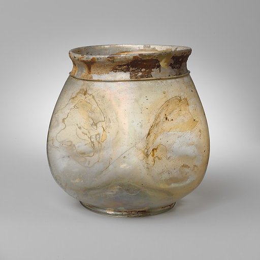 Glass beaker with indented sides
