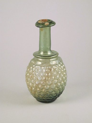 Glass bottle in the shape of a bunch of grapes