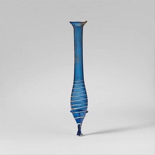 Glass perfume bottle with opaque white trail