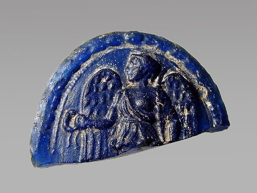 Glass medallion of winged Victory