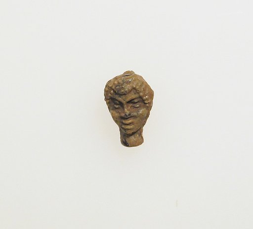 Glass pendant in the shape of a Black African's head