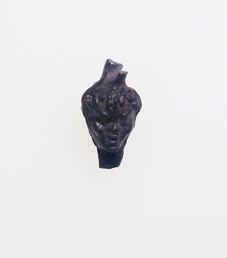 Glass pendant in the shape of a Black African’s head