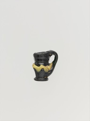 Glass pendant shaped like a jug