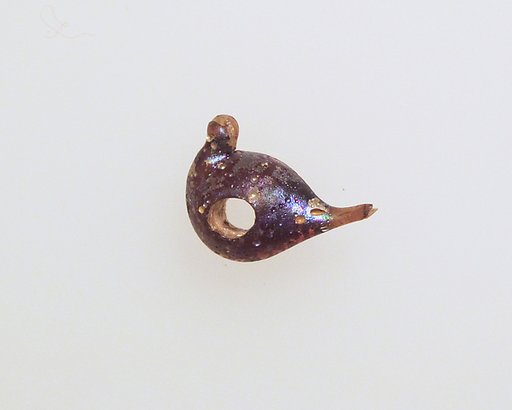 Glass pendant in the form of a bird