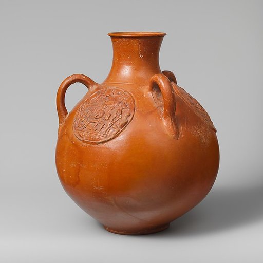 Three-handled jug with relief medallions