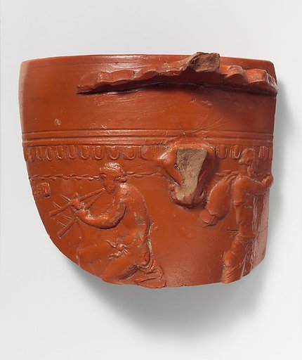 Terracotta fragment of an Arretine cup with satyrs