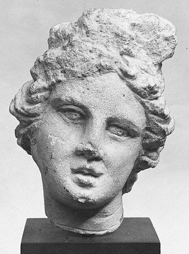 Limestone head of a girl