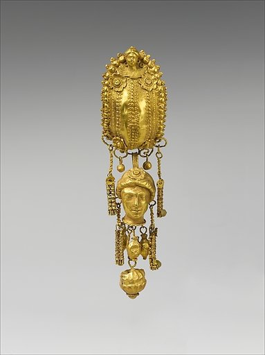 Earring with pendants and female head