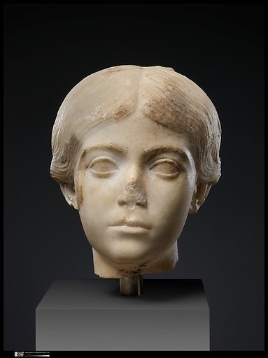 Two marble portrait heads from a relief