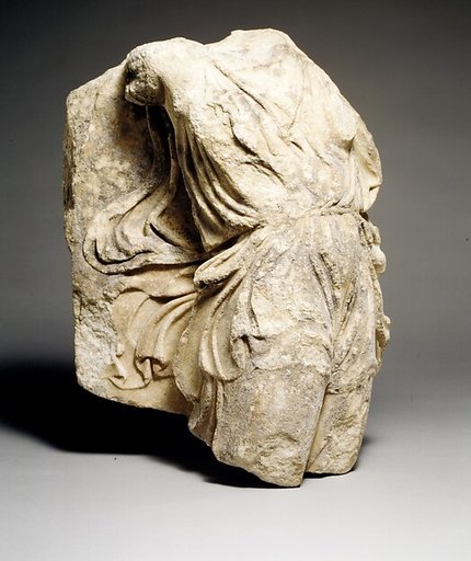 Fragment of a marble relief with a Nike