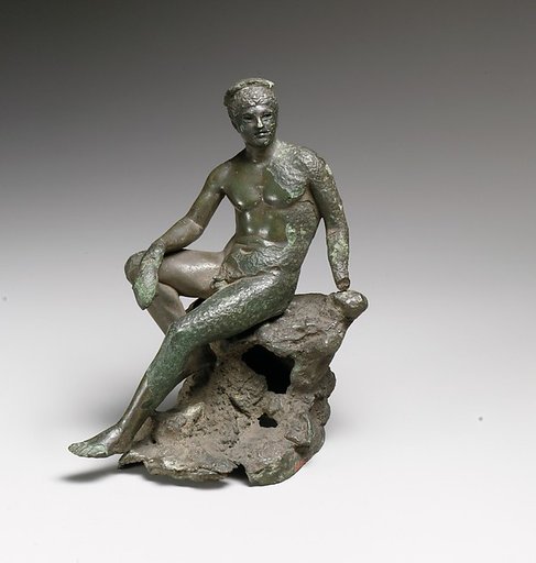 Bronze statuette of Hermes seated on a rock