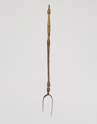 Bronze fork with the head of a wolf