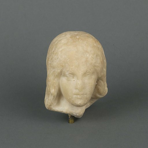 Marble head of a female statuette