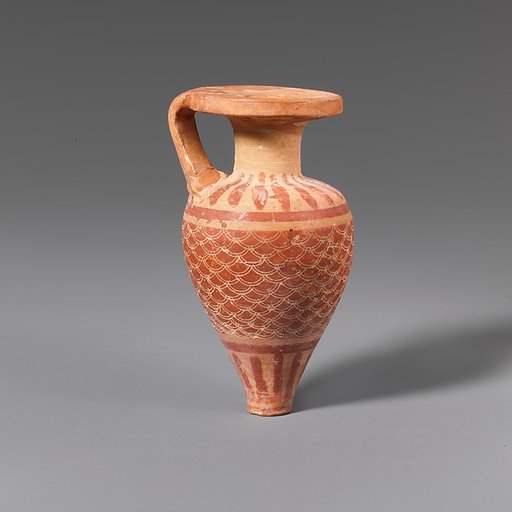 Terracotta pointed aryballos (oil flask)