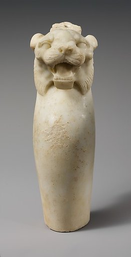 Marble leg of a table with a tiger's head