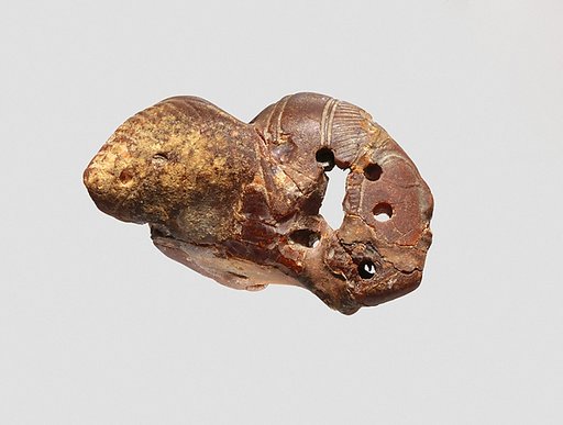 Pendant: winged female head