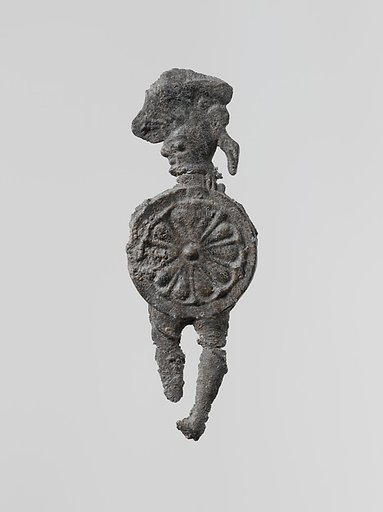 Lead figure of a warrior with a helmet and shield