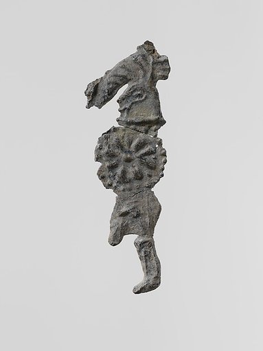 Lead figure of a warrior with a helmet and shield