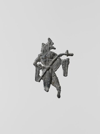 Lead figure of a man with a spear or scepter