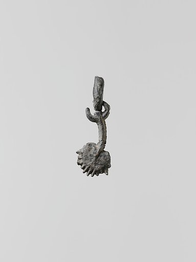 Lead ornament, perhaps vegetal