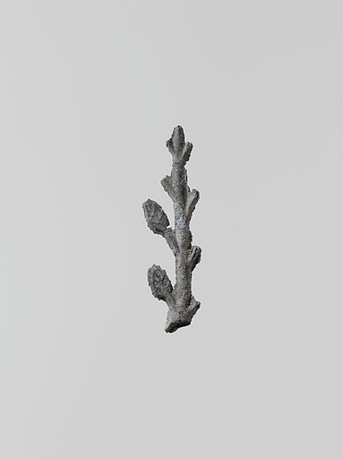 Lead ornament in the form of a branch
